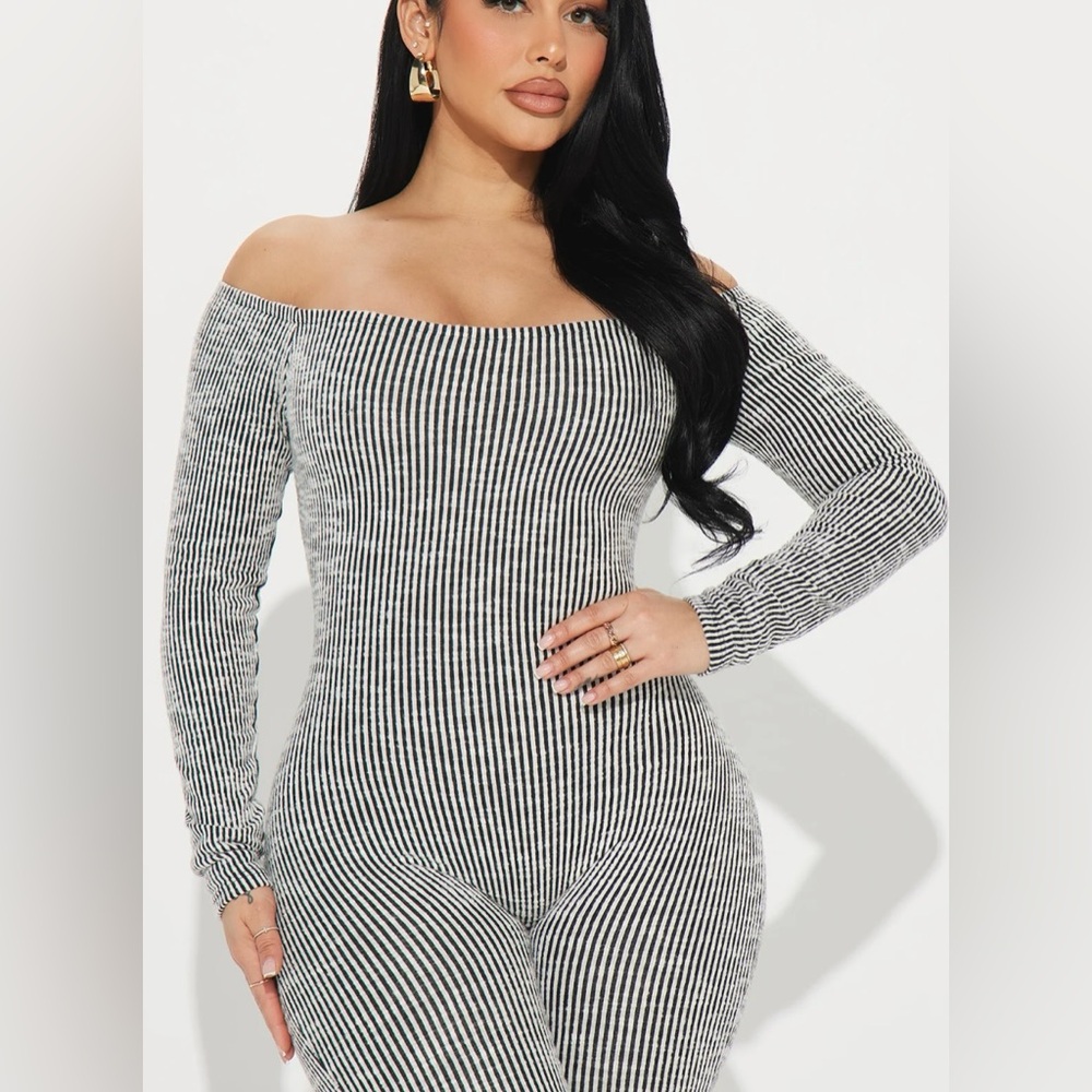 Fashionova one piece jumpsuit, size medium. Color grayish black.